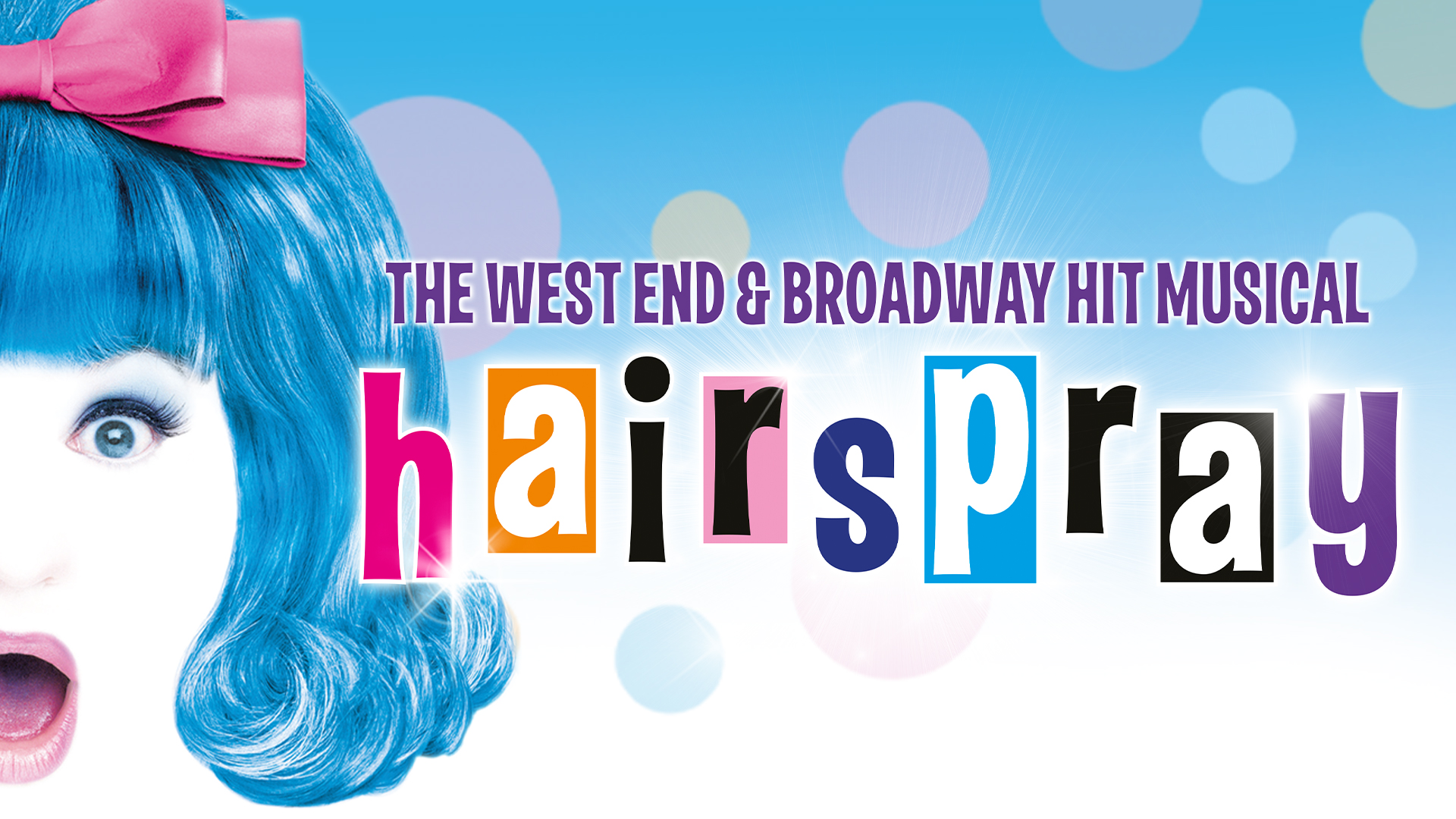 A shocked girl with large blue hair and a big pink bow next to the word 'Hairspray' in funky, colourful lettering 