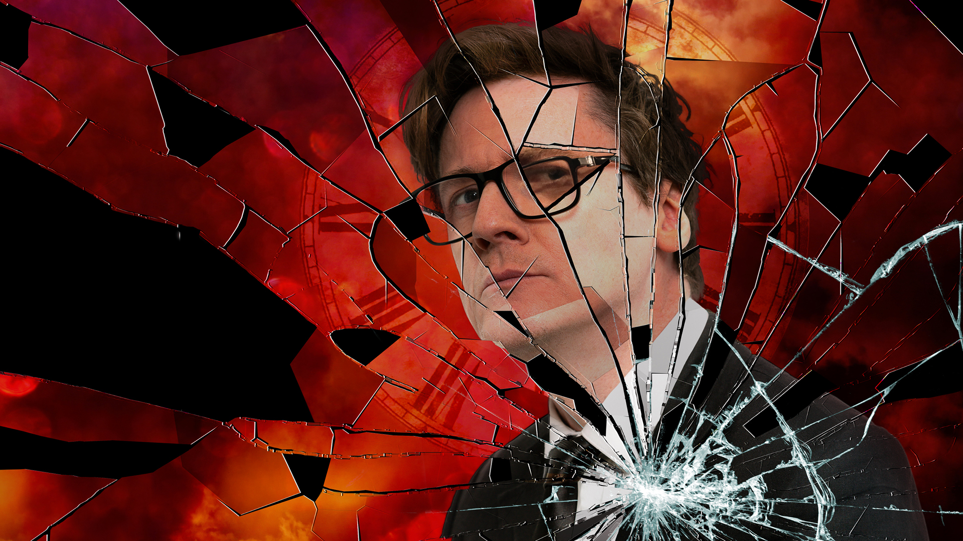 A man wearing a suit and glasses - the image looks like glass that has been shattered